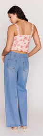 Model wearing Light Wash Straight Leg Denim Jeans viewed from the back, showcasing the high-rise and classic five-pocket design.