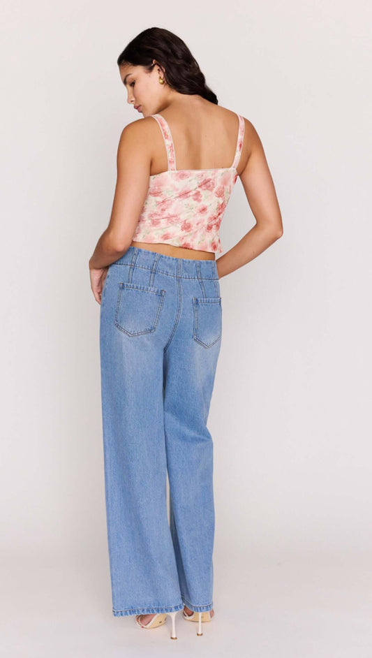 Model wearing Light Wash Straight Leg Denim Jeans viewed from the back, showcasing the high-rise and classic five-pocket design.
