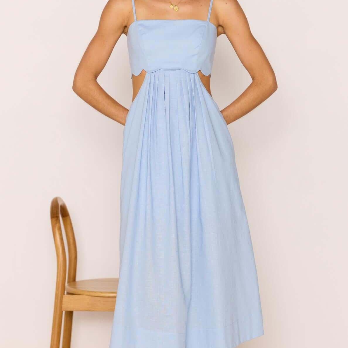 Cotton Linen Blend Blue Cut-Out Midi Dress featuring a fitted bodice and scalloped detailing, perfect for summer outings.