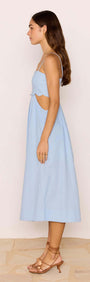 Cotton Linen Blend Blue Cut-Out Midi Dress featuring a side view showcasing its fitted bodice and subtle cut-out sides.