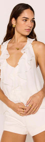 Model wearing a White Ruffle Halter Top with cascading ruffles and a flattering neckline.