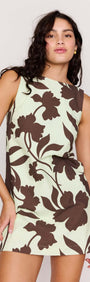 Mint Chocolate Cotton Floral Low Back Shift Dress showcasing a model in a sleeveless design with a chocolate floral print.