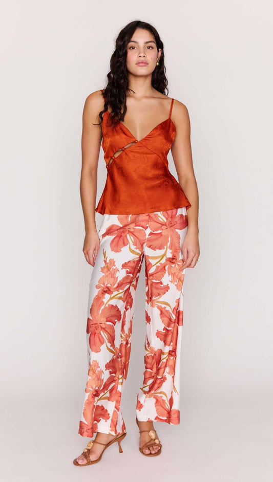 Model wearing Orange Bead Detail Satin Cami paired with floral pants, showcasing elegance and style.