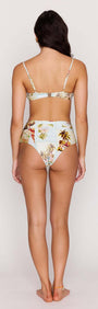 Back view of a model wearing a Palm Print Underwire Bikini Bra Top with high-waisted bikini bottoms, showcasing tropical prints.