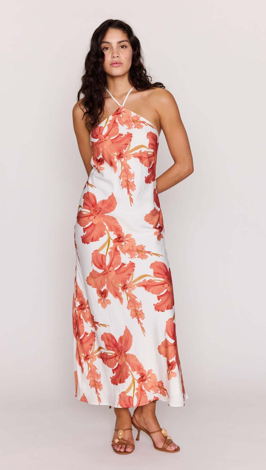Peach Hibiscus Halter Midi Dress featuring a floral print, halter neckline, and flowing silhouette.