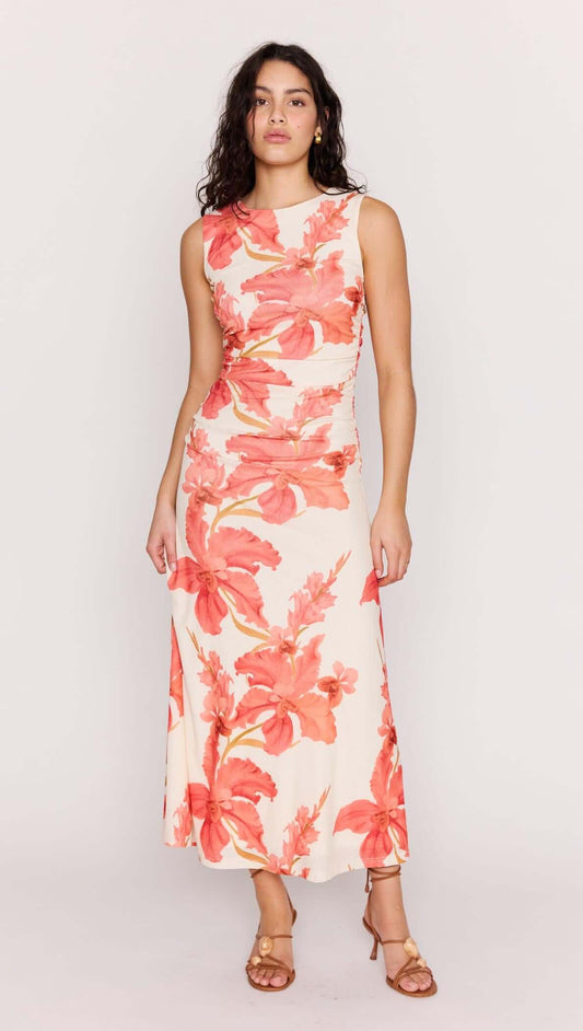 Model wearing the Peach Hibiscus Mesh Midi Dress with vibrant floral print, showcasing its flattering silhouette.