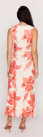 Back view of the Peach Hibiscus Mesh Midi Dress featuring peach floral print and subtle ruching for a flattering fit.