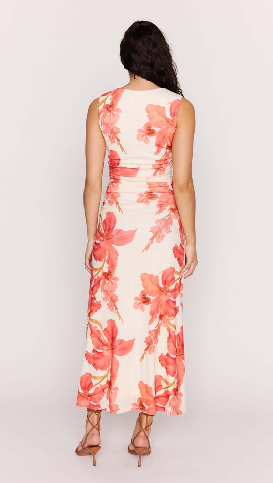 Back view of the Peach Hibiscus Mesh Midi Dress featuring peach floral print and subtle ruching for a flattering fit.
