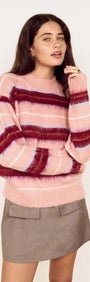Model wearing a Pink Brushed Stripe Crew Neck Sweater styled with a mini skirt, showcasing cozy and vibrant hues.