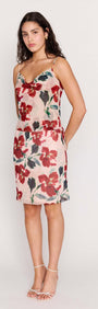 Pink Floral Bias Slip Skirt displayed on a model, featuring a floral print and a flattering knee-length design.