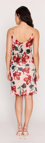 Back view of a model wearing the Pink Floral Cowl Neck Cami Top with a soft floral print.