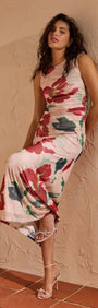 Pink Floral Mesh Midi Dress displayed on a model, featuring a floral print and flattering silhouette.
