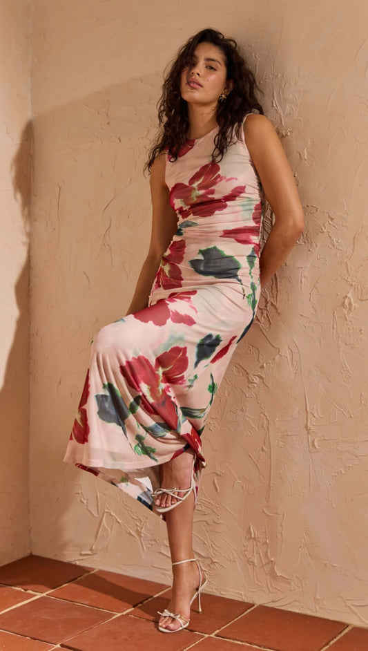 Pink Floral Mesh Midi Dress displayed on a model, featuring a floral print and flattering silhouette.