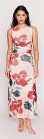 Pink Floral Mesh Midi Dress worn by a model, featuring vibrant floral patterns and a body-skimming silhouette.