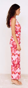 Model wearing a Pink Floral Off-Shoulder Mesh Midi Dress in profile view, showcasing floral patterns and elegant design.