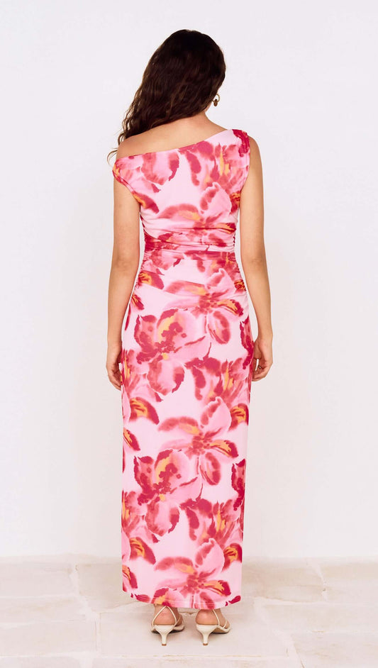 Back view of a woman wearing a Pink Floral Off-Shoulder Mesh Midi Dress, showcasing the vibrant floral pattern.