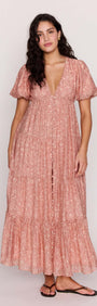 Red Floral Puff Sleeve Maxi Dress featuring soft puff sleeves and a tiered skirt design.