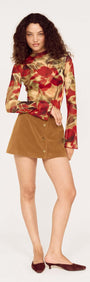 Model wearing a Red Floral Sheer Mesh High Neck Top paired with a brown skirt.