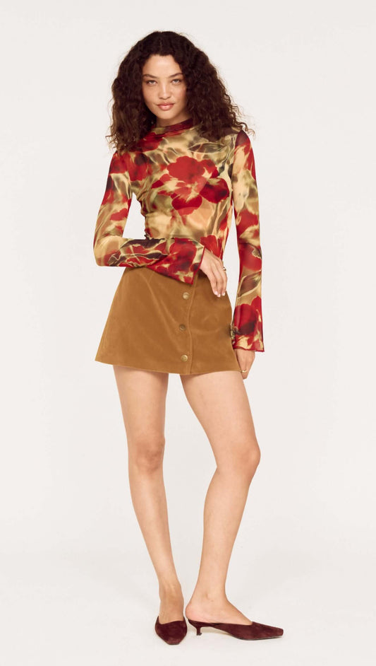 Model wearing a Red Floral Sheer Mesh High Neck Top paired with a brown skirt.