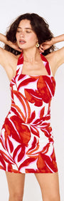 Red Palm Print Halter Neck Mini Dress featuring a model wearing a bold floral design, perfect for summer events and occasions.