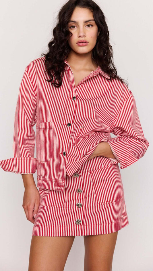 Red Pinstriped Denim Jacket styled with matching skirt, featuring vertical stripes and relaxed fit for effortless fashion.