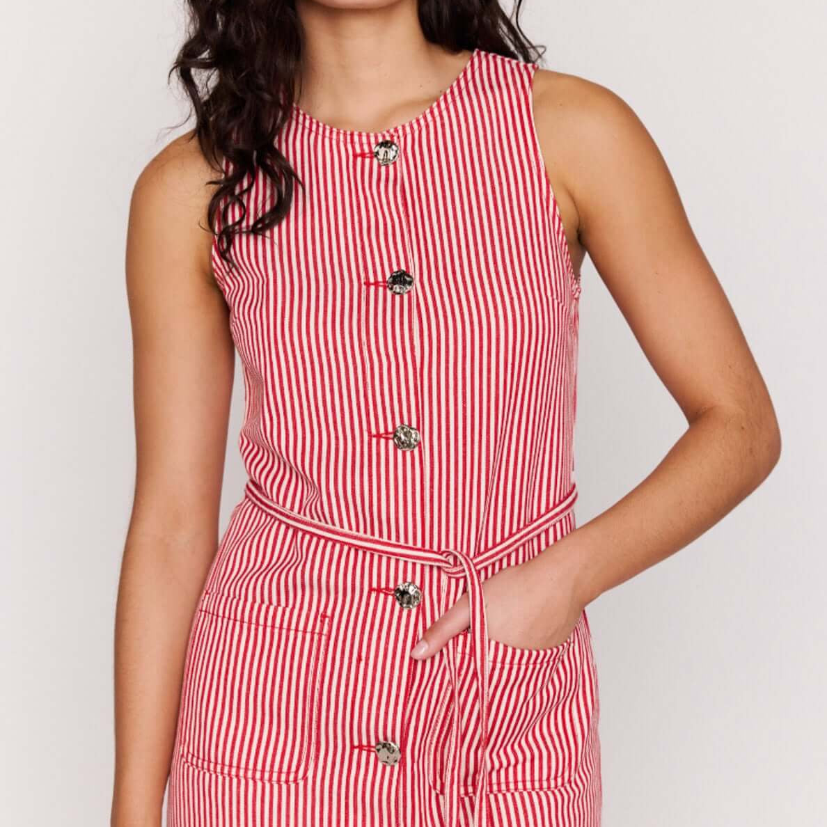 Red Pinstriped Denim Mini Shift Dress worn by a model showcasing its sleeveless design and button-front style.