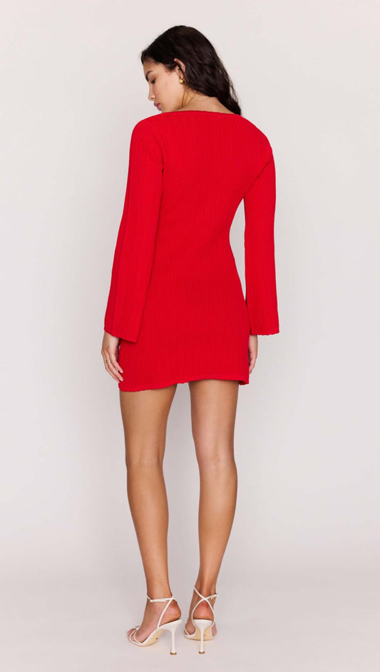 Back view of the Red Ribbed Knit Mini Dress showcasing long sleeves and a flattering fit.