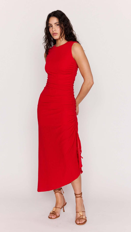 Red Ruched Stretch Midi Dress worn by a model, showcasing its sleek design and adjustable side drawstring.