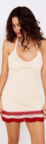 Red Stripe Crochet Halter Mini Dress displayed on a model, showcasing its playful design and summer appeal.