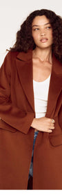 Model wearing a Soft Touch Tailored Coat in Chocolate, styled elegantly for a chic winter look.