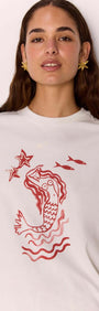 Cotton Mermaid Print T-Shirt featuring an exclusive mermaid artwork print in a relaxed fit and one-shoulder design.