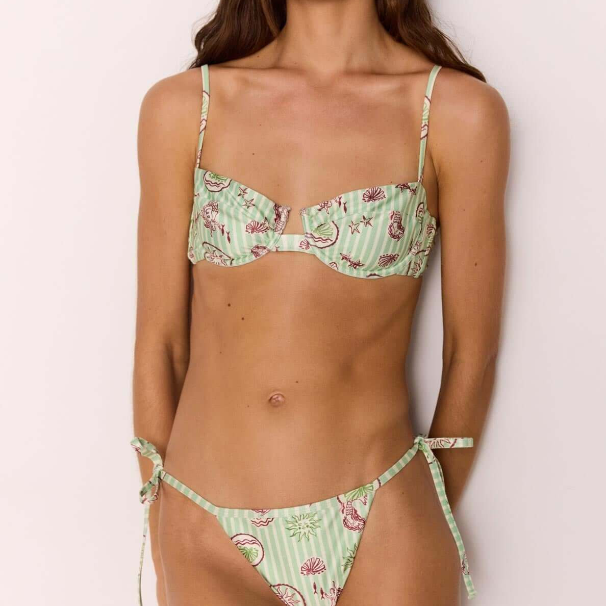 Model wearing a Green Stripe Printed Bikini Bra Top with underwire support and adjustable straps.