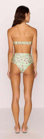 Back view of a model wearing Green Stripe Printed High Waist Bikini Bottoms with vintage-inspired design.