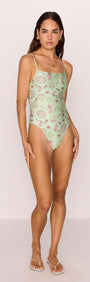 Green Stripe Printed Low-Back One Piece Swimsuit displayed on a model, featuring a vintage-inspired design.