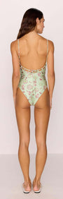 Back view of the Green Stripe Printed Low-Back One Piece Swimsuit with shell and sea motif print by MINKPINK.