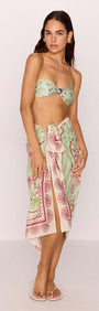 Model wearing Green Stripe Printed Sarong, styled as a beach wrap, showcasing its versatile and lightweight design.