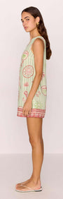 Linen Blend Green Stripe Printed Shift Mini Dress shown on model in profile view, featuring coastal motif print and relaxed silhouette.