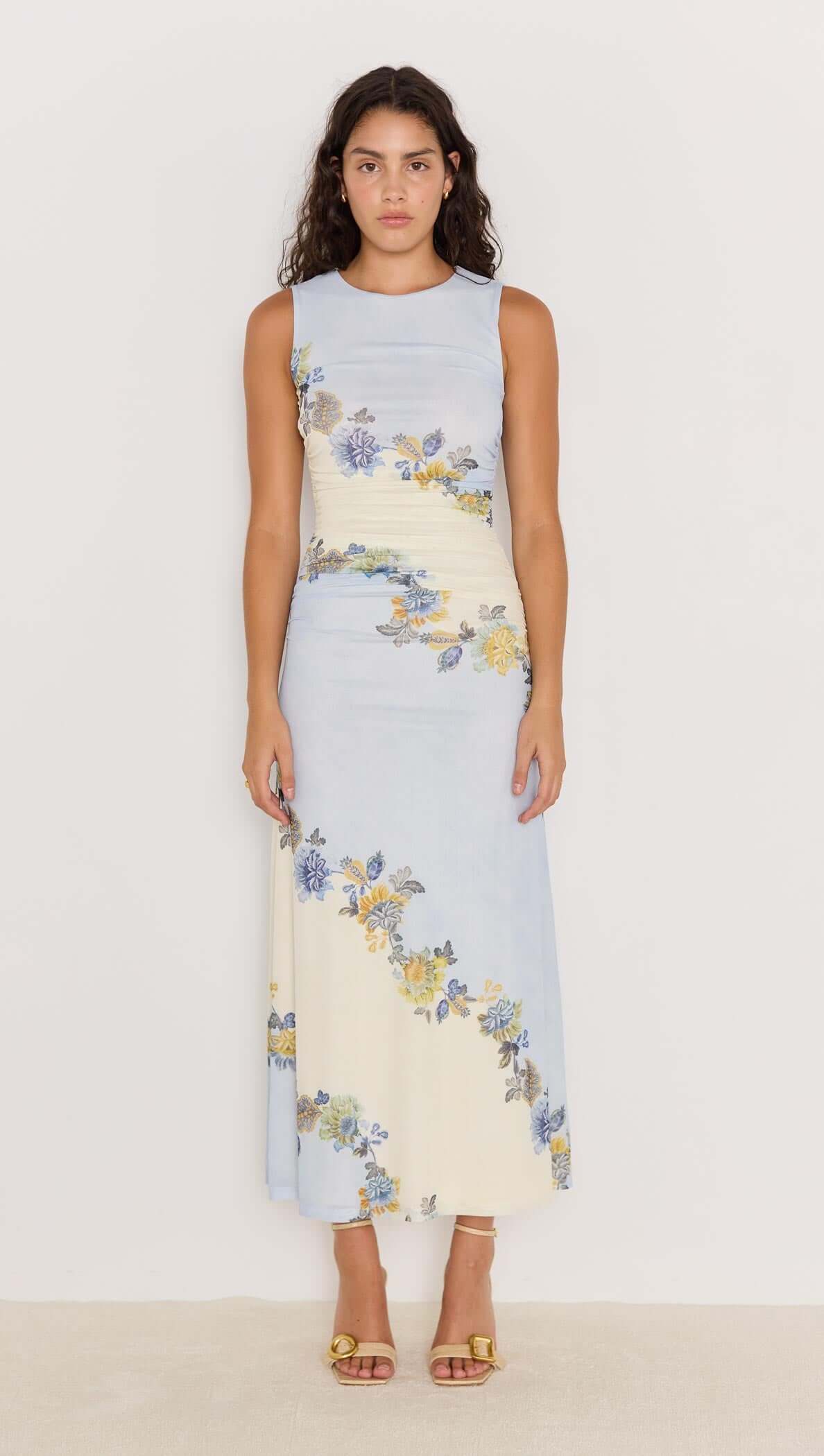 Lucia blue floral mesh maxi dress featuring a sleeveless design and soft stretch mesh fabric.