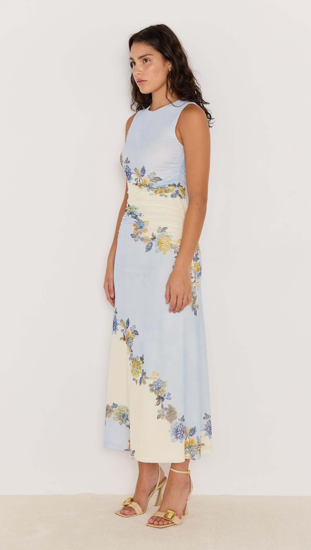Lucia blue floral mesh maxi dress featuring a sleeveless design and delicate floral accents.