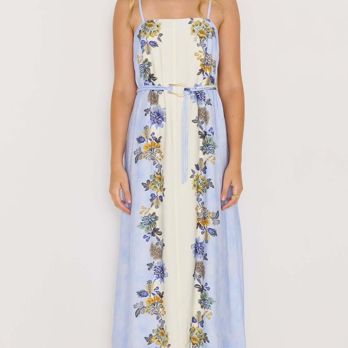 Lucia blue floral midi dress with tie waist, featuring spaghetti straps and a flowing skirt, perfect for warm weather.