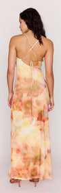 Back view of the Sunset Tonal Mesh Maxi Dress featuring a watercolour floral print and adjustable ties.