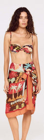 Model wearing Vinatage Coastal Print Long Sarong with tropical design, perfect for resort styling.