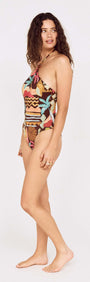 Model wearing a Vintage Coastal Print Halterneck One Piece swimsuit, showcasing a vibrant pattern and chic design.
