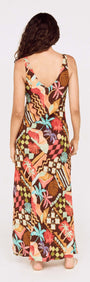 Back view of a woman wearing a Vintage Coastal Print Keyhole Midi Dress with vibrant patterns and a flowy design.