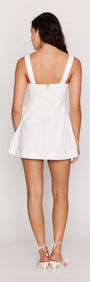 Back view of the stylish White Denim Square Neck Mini Dress featuring a square neckline and comfortable fit.