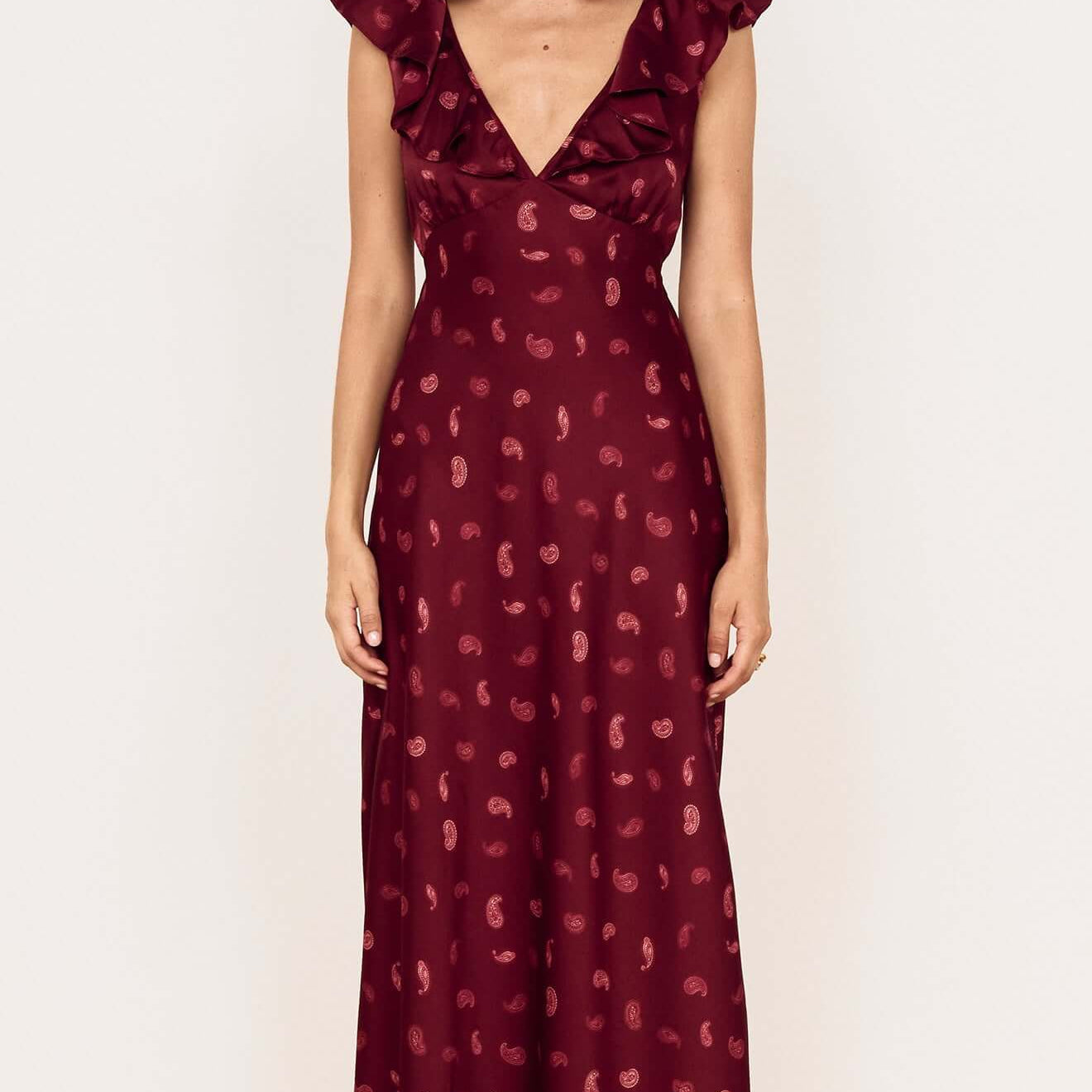 Wine Satin Paisley Ruffled Bias Midi Dress in a stunning burgundy color, featuring ruffles and a plunging neckline.
