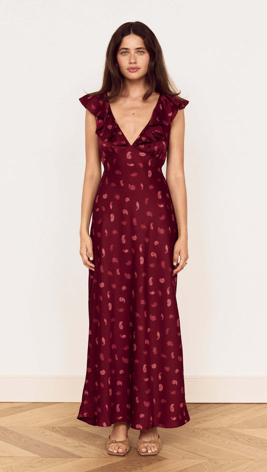 Wine Satin Paisley Ruffled Bias Midi Dress in a stunning burgundy color, featuring ruffles and a plunging neckline.
