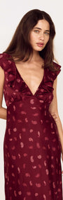 Wine Satin Paisley Ruffled Bias Midi Dress, featuring a plunging neckline and elegant ruffles on the shoulders.