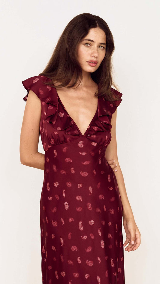 Wine Satin Paisley Ruffled Bias Midi Dress, featuring a plunging neckline and elegant ruffles on the shoulders.