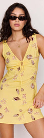 Yellow Printed ECOVERO Summer Mini Dress featuring seashell prints and a flattering V-neckline.